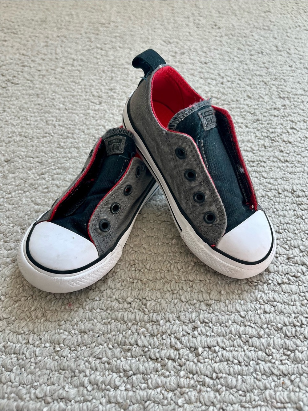 Converse Kids Slip-On Canvas Sneakers in Black & Gray with Red Lining